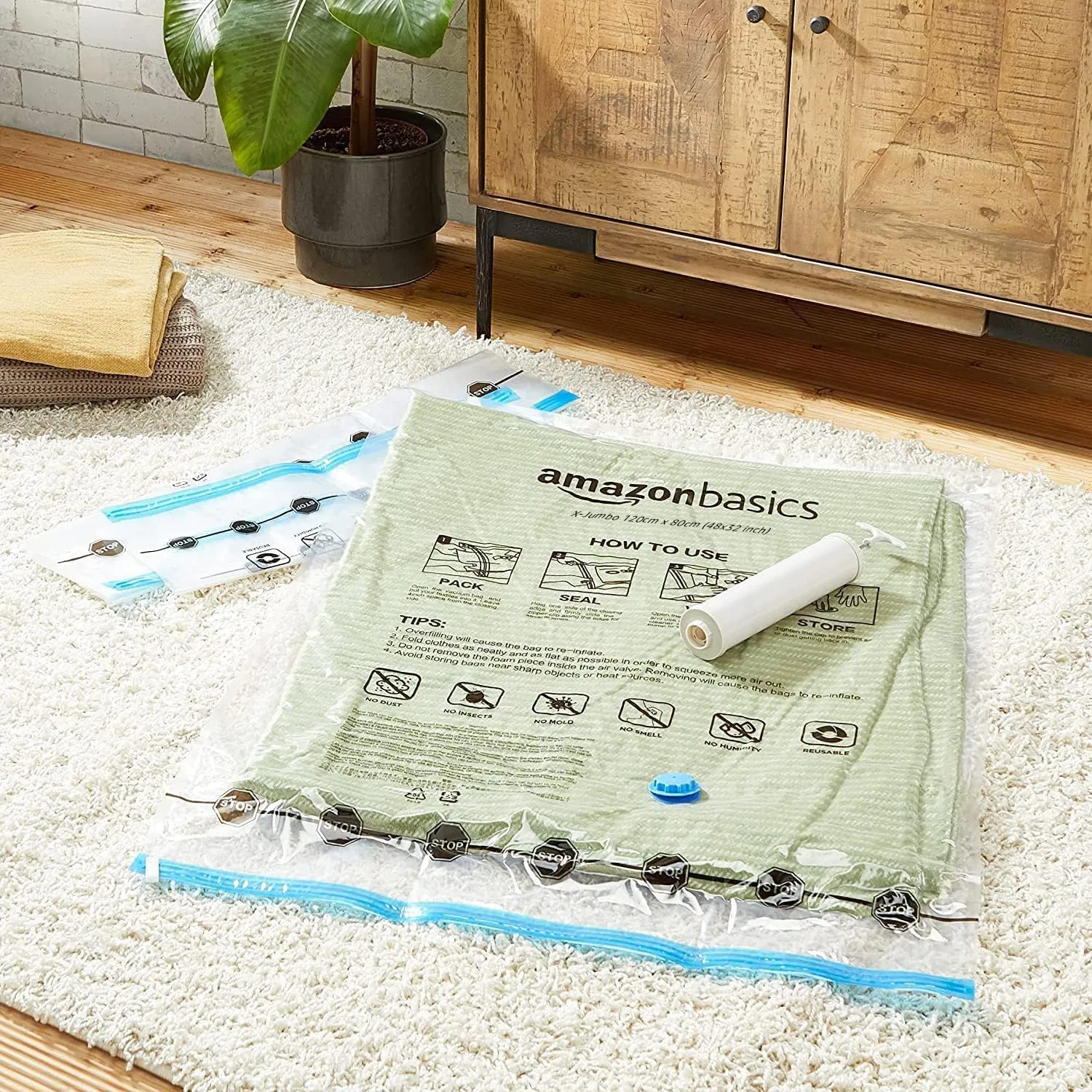 Amazon Basics Vacuum Compression Space Saving Storage Bags with Hand Pump for Travel, Multiple Sizes for Clothes and Blankets, Clear, 12 Pack (3 Small, 3 Medium, 3 Large & 3 Jumbo)