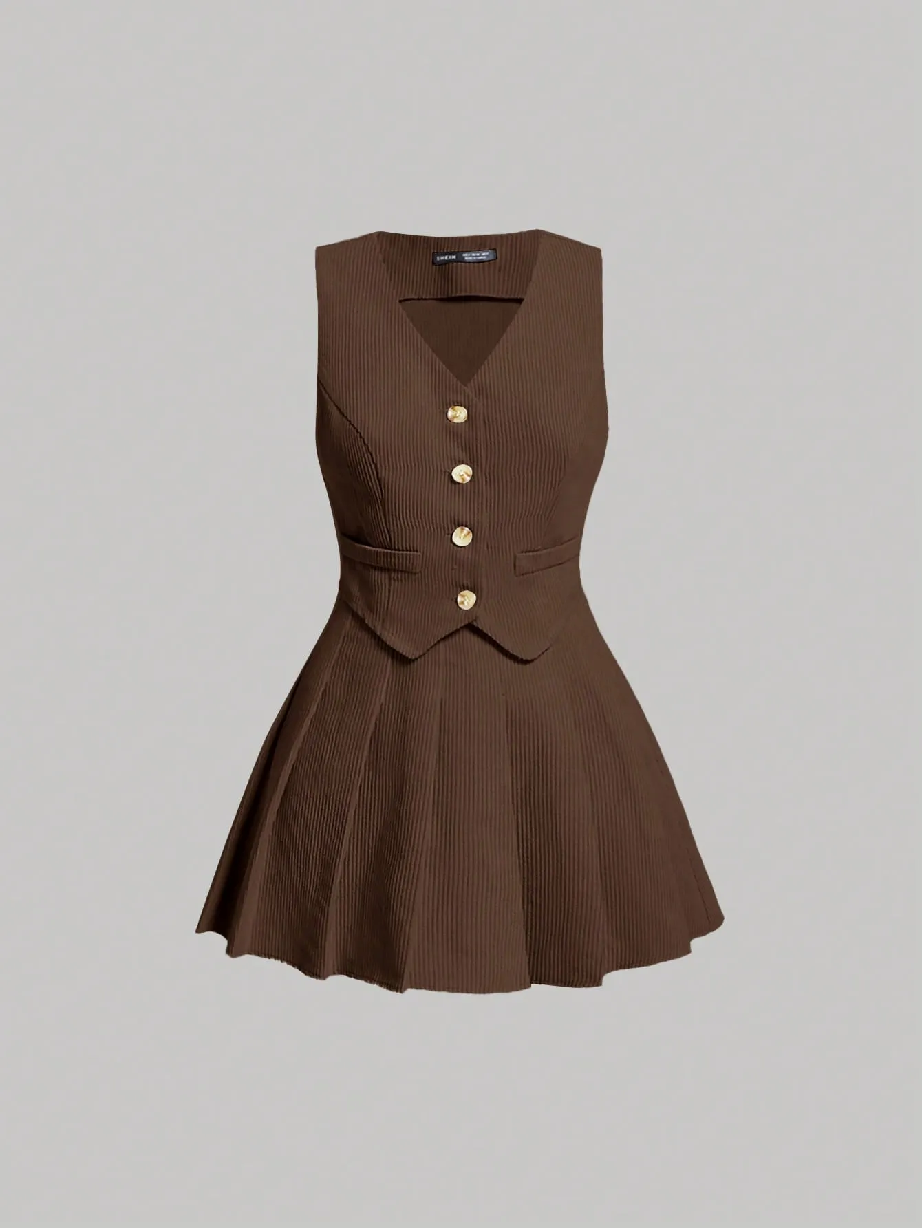 Conjunto de Chaleco y Falda Plisada