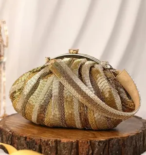 Golden antique batua bag