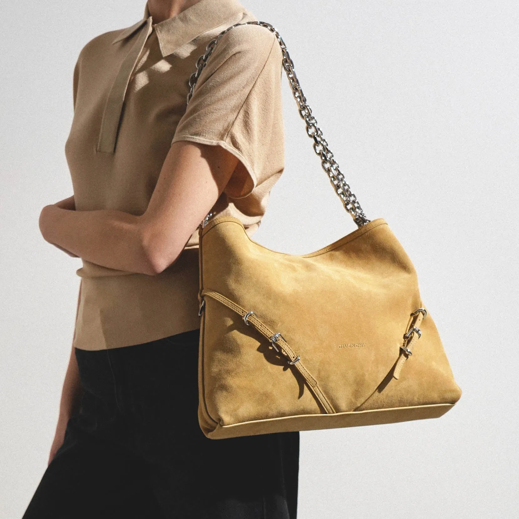 Voyou medium beige chain bag